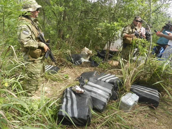 A handout photograph of packages of cocaine confiscated by Paraguayan police in Canindeyu
